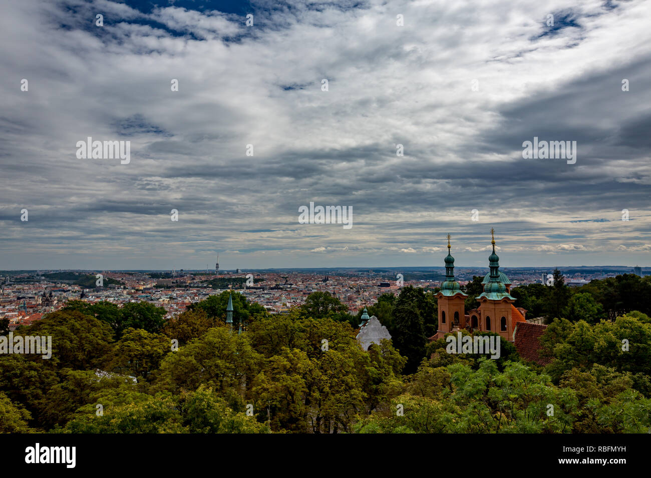 Amazing architecture of Cathedral of Saint Lawrence in Petrin Park, Prague, Czech Republic as seen from above, observation and lookout tower Stock Photo