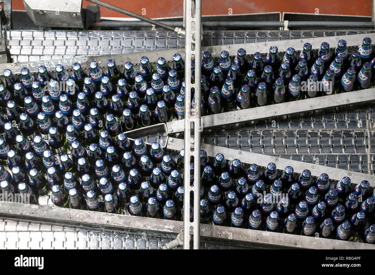 Obernai (north-eastern France): Kronenbourg Brasserie,Obernai (north-eastern France). 2015/05/27. Bottling line with glass bottles "1664" (pale lager) Stock Photo