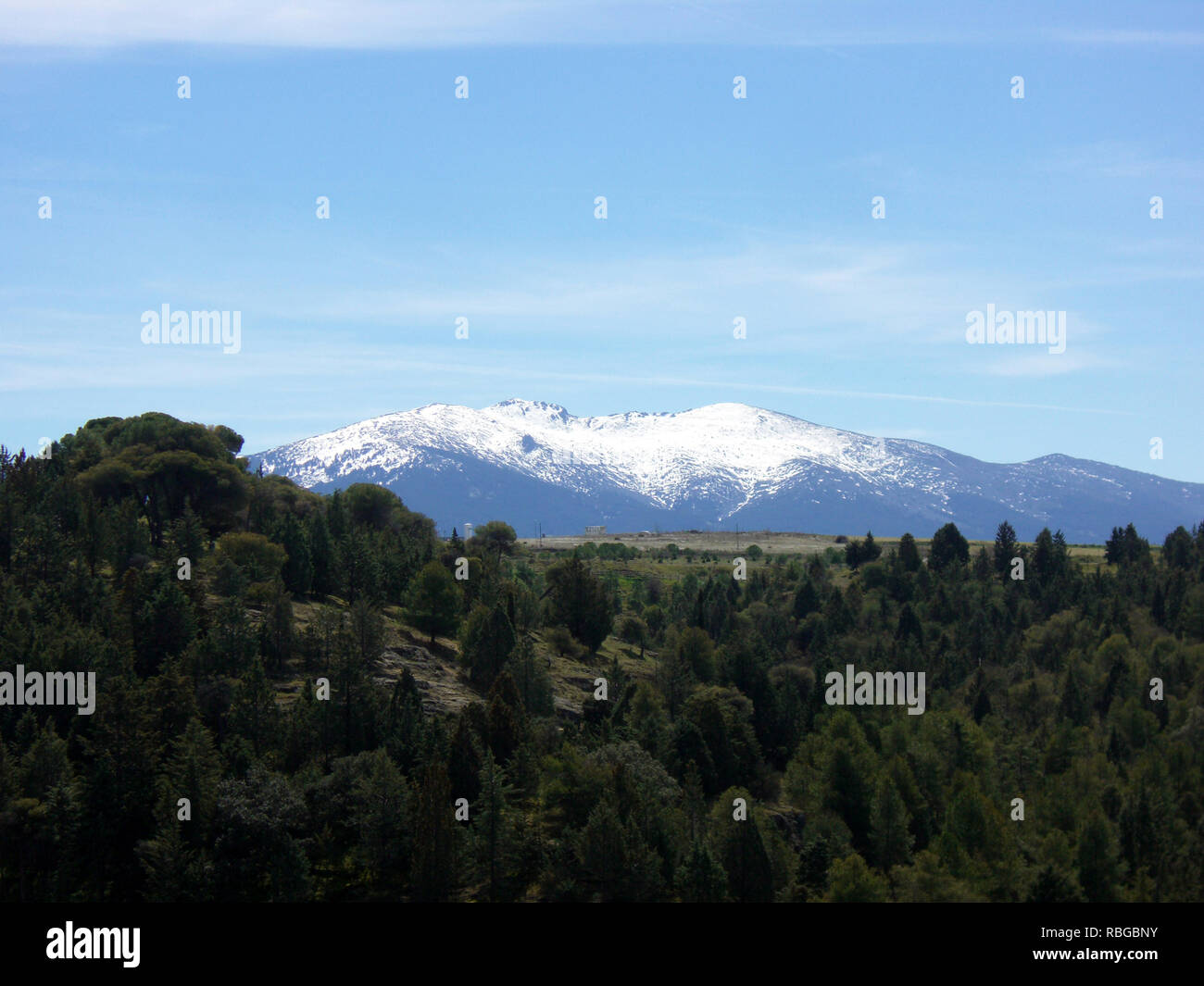 Snow capped mountains view from a Spanish countryside Stock Photo
