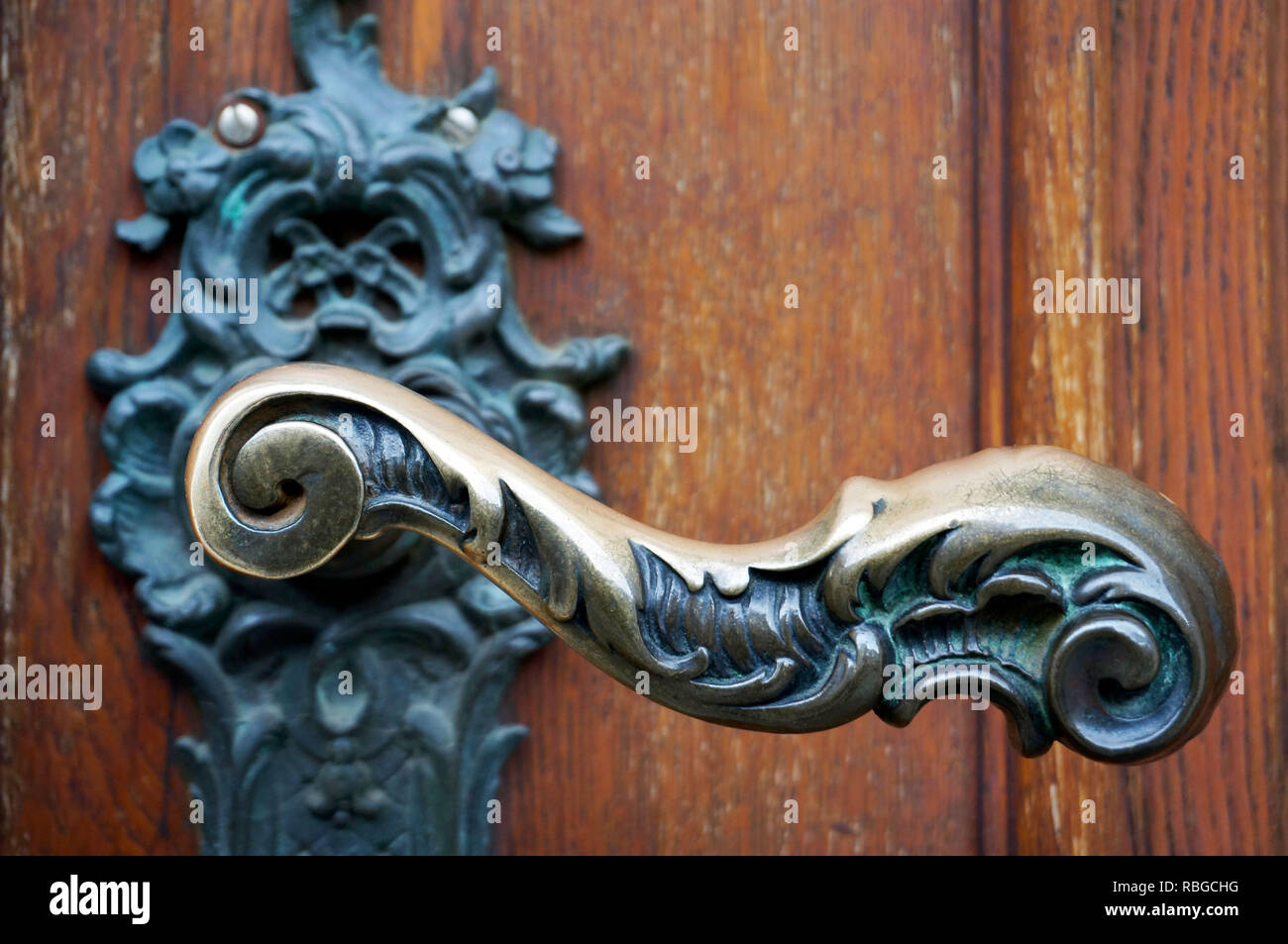Historic old door knob made of brass Stock Photo