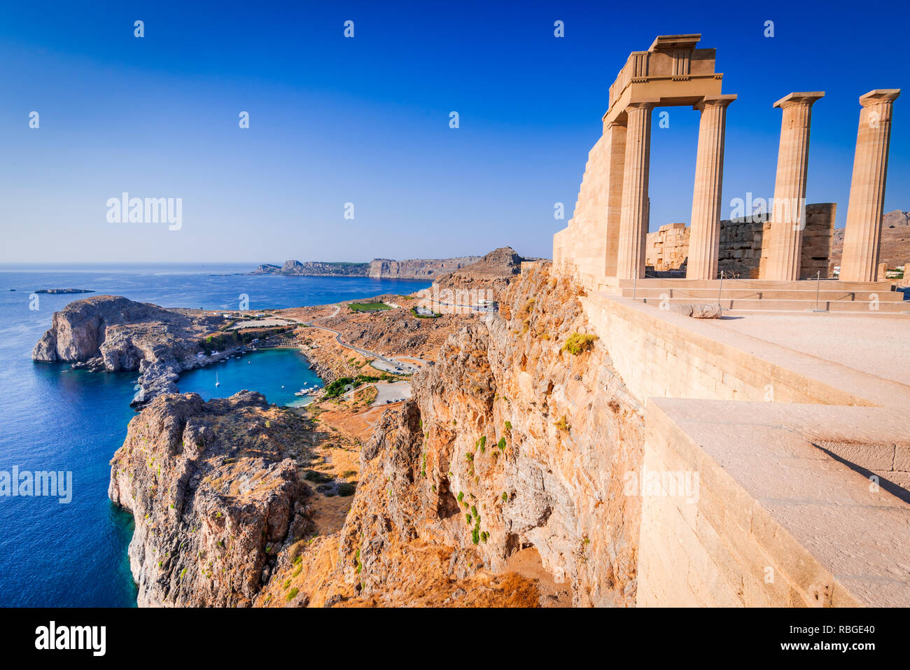 Rhodes, Greece. Lindos small whitewashed village and the Acropolis, scenery of Rhodos Island at Aegean Sea. Stock Photo