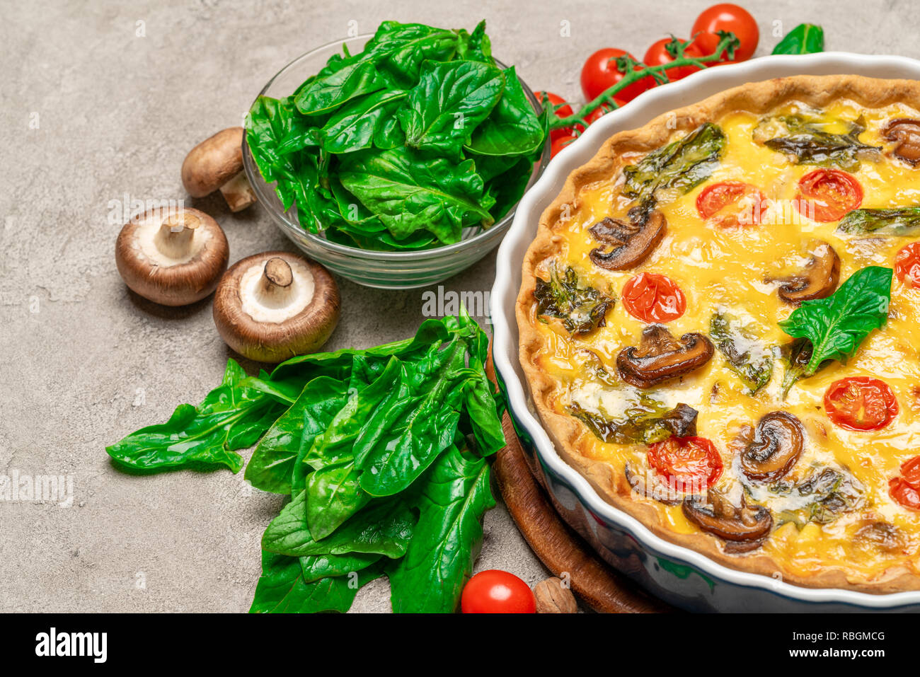 Baked homemade quiche pie in ceramic baking form Stock Photo Alamy