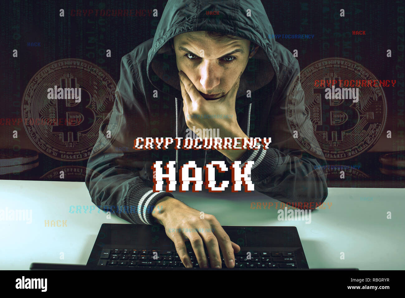 A hacker with a face is trying to steal cryptocurrency using a computer.  Scam at Cryptojacking Stock Photo - Alamy