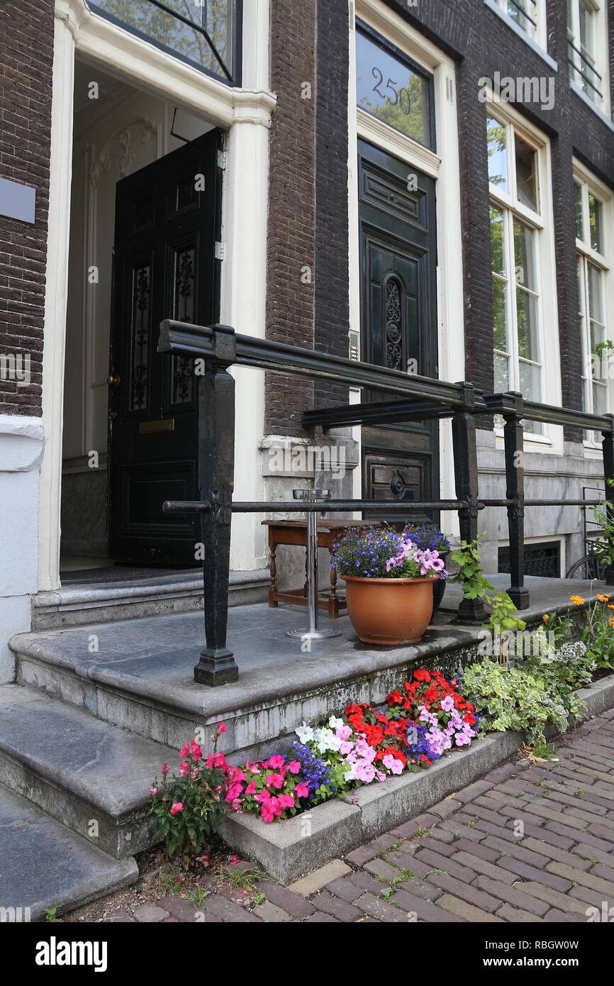 Amsterdam residential street - generic old house ornate door. Netherlands rowhouse. Stock Photo