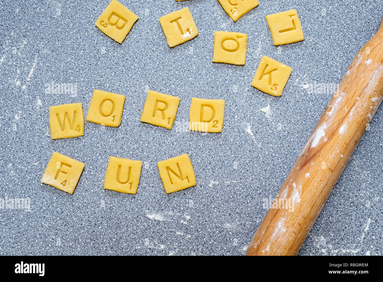 Word fun - scrabble words made from biscuit / cookie dough. Stock Photo