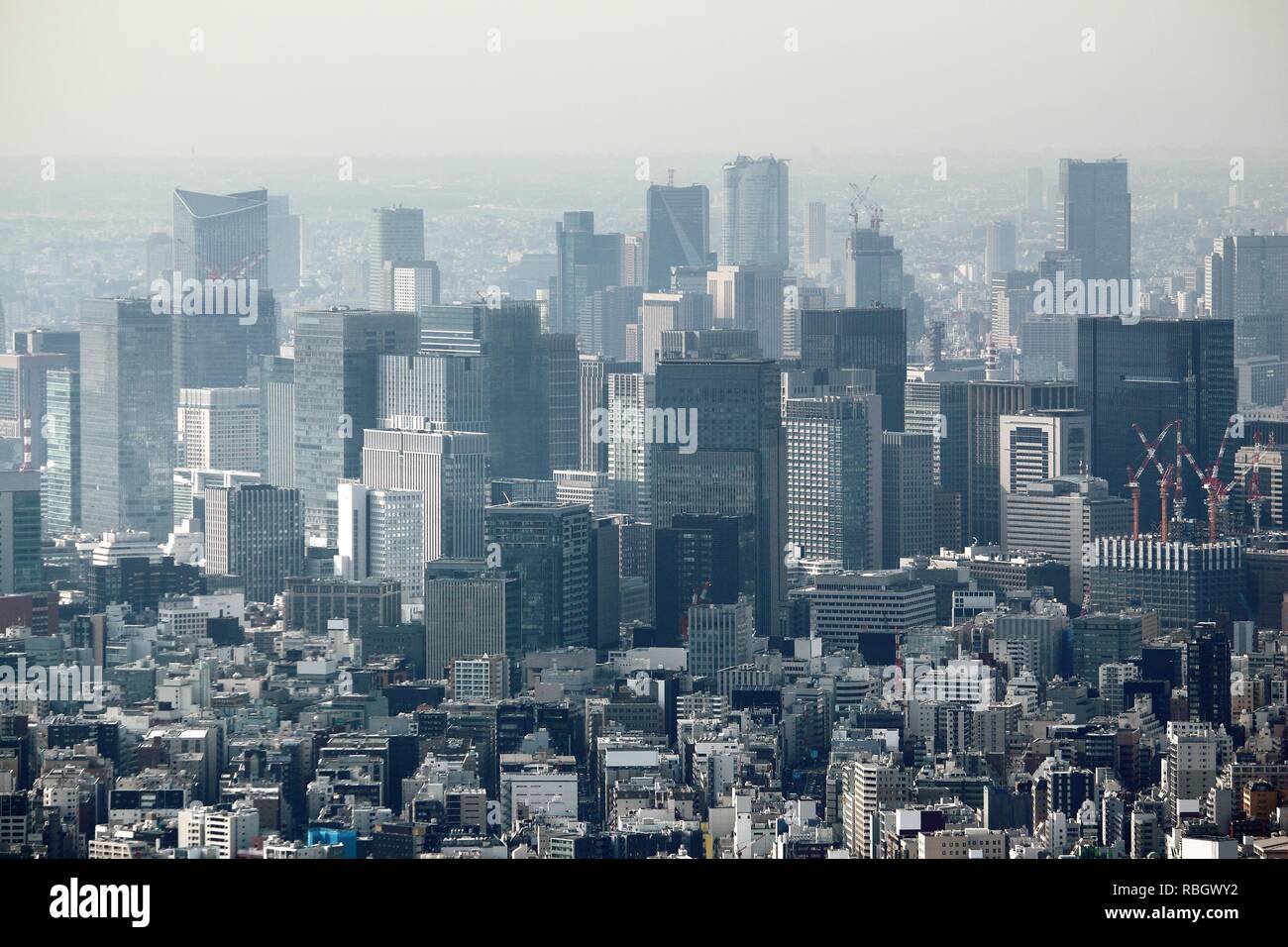 Tokyo city, Japan. Hazy skyline of Marunouchi district. Stock Photo