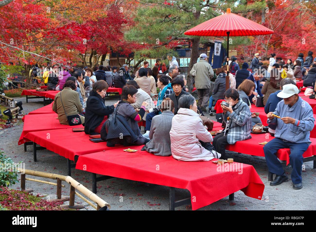 KYOTO, JAPAN - NOVEMBER 24, 2016: People visit Eikando Zenrinji temple tea garden in Kyoto, Japan. 19.7 million foreign tourists visited Japan in 2015 Stock Photo