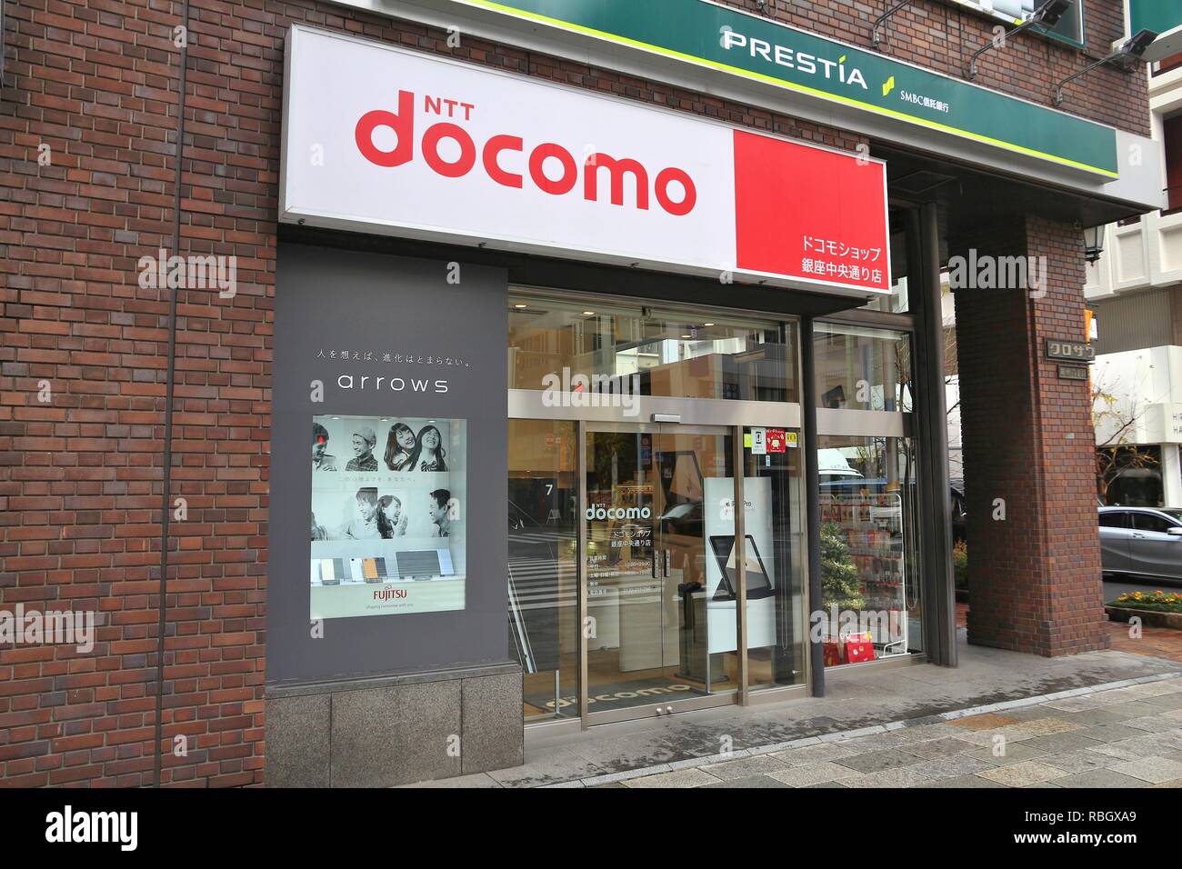 TOKYO, JAPAN - DECEMBER 1, 2016: NTT Docomo mobile phone network store in Tokyo, Japan. There are 146.6 million mobile phones in use in Japan (2013). Stock Photo