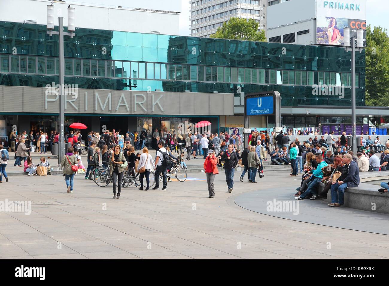 BERLIN, GERMANY - AUGUST 26, 2014: People visit the Alexander Square (Alexanderplatz) in Berlin. Berlin is Germany's largest city with population of 3 Stock Photo