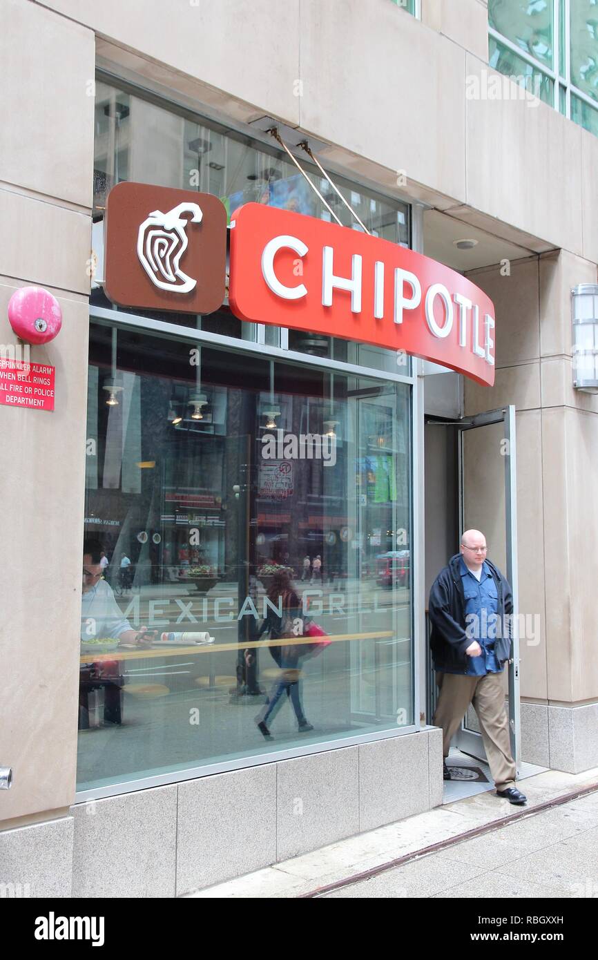 CHICAGO, USA JUNE 26, 2013 Person exits Chipotle restaurant in