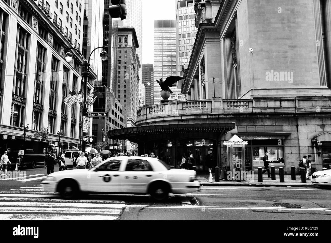 NEW YORK, USA - JULY 1, 2013: People enter Grand Central Terminal in New York. The station exists since 1871. It had passenger ridership of 82 million Stock Photo