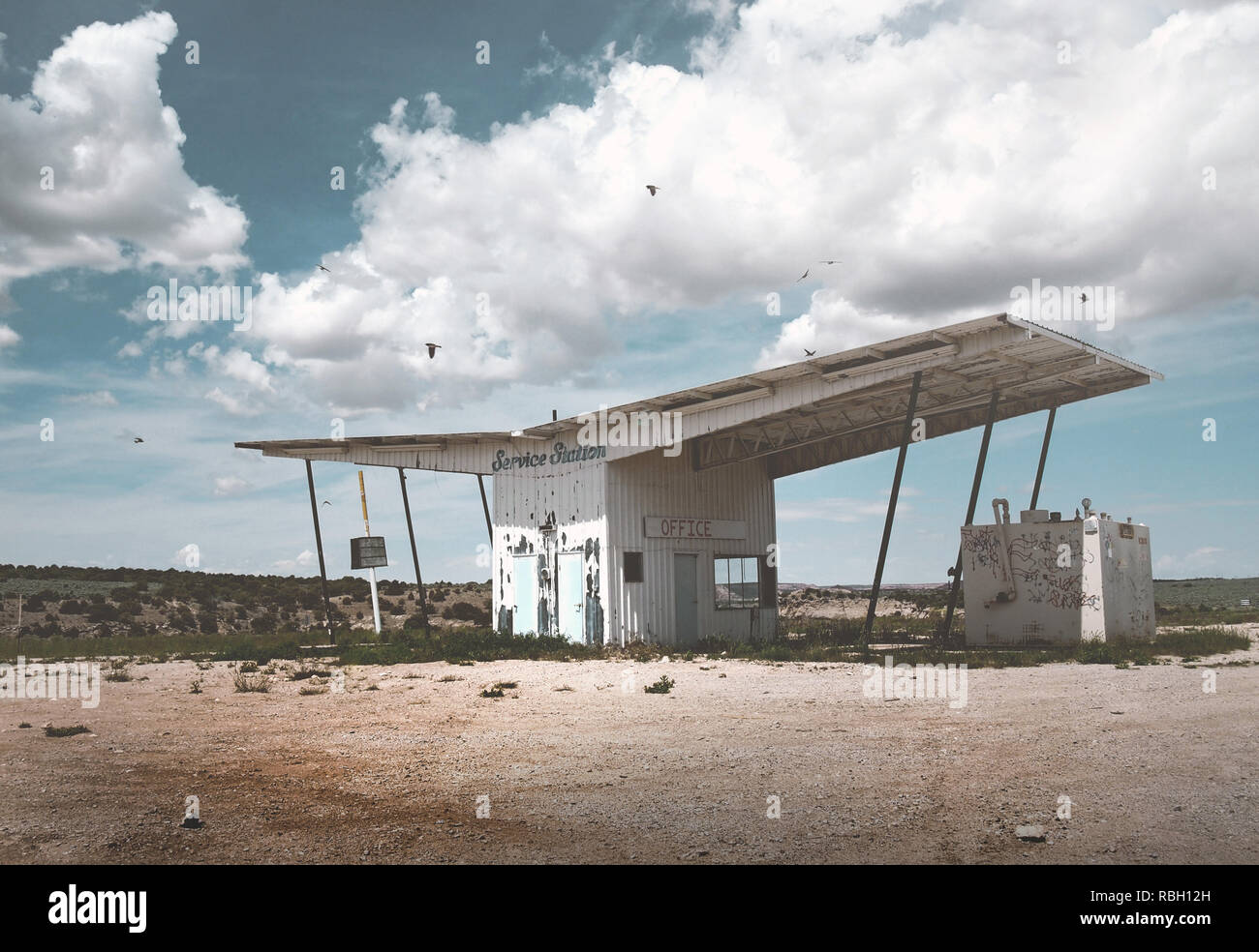 Abandoned ghost gas station, spooky scenery in the desert Stock Photo