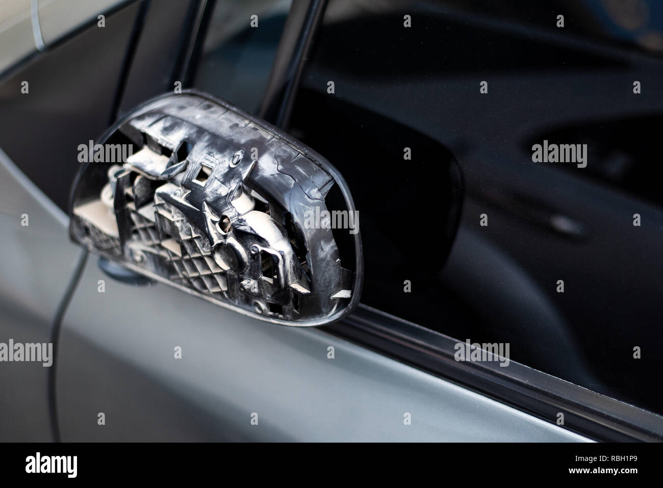 Car with broken rear mirror close up Stock Photo