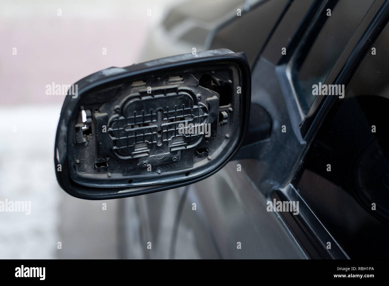 Car with broken rear mirror close up Stock Photo
