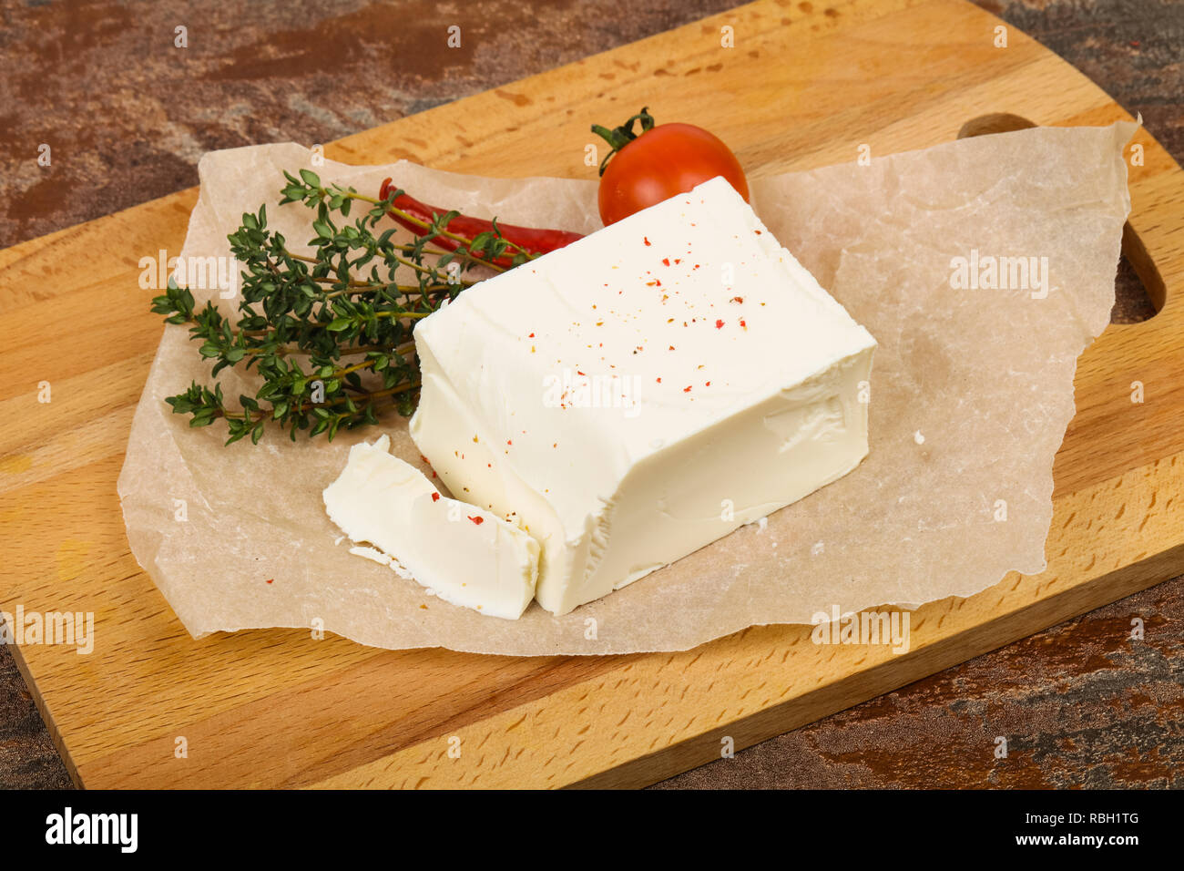Traditional Feta Cheese served thyme Stock Photo - Alamy
