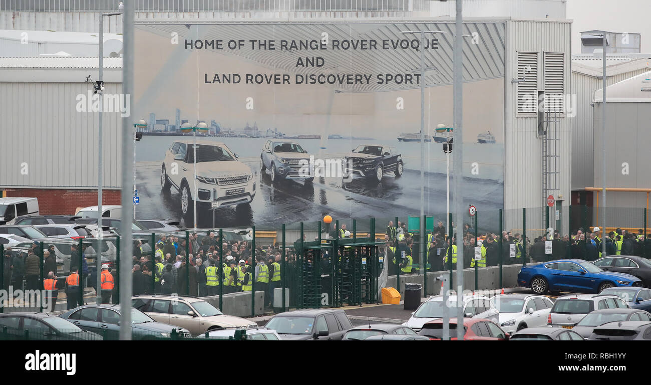 Staff gather outside the jaguar land rover site in halewood hires
