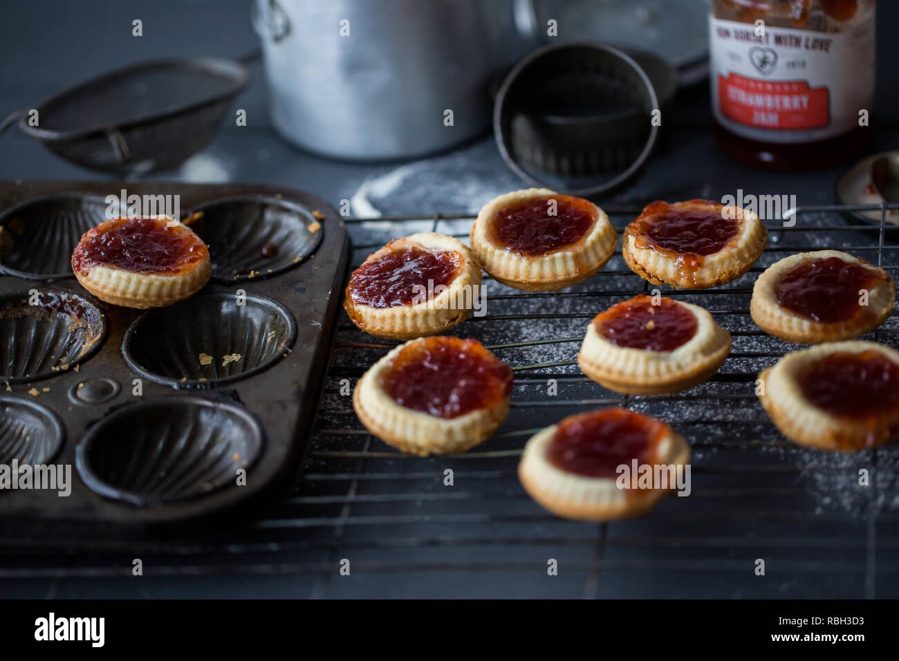 Home made strawberry jam tarts. Stock Photo