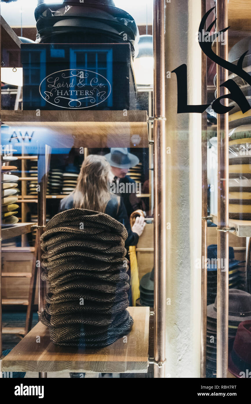 London, UK - January 5, 2019: Hats at a window display of Laird & Co hatters shop in Covent Garden, London, UK. Covent Garden is a famous tourist area Stock Photo