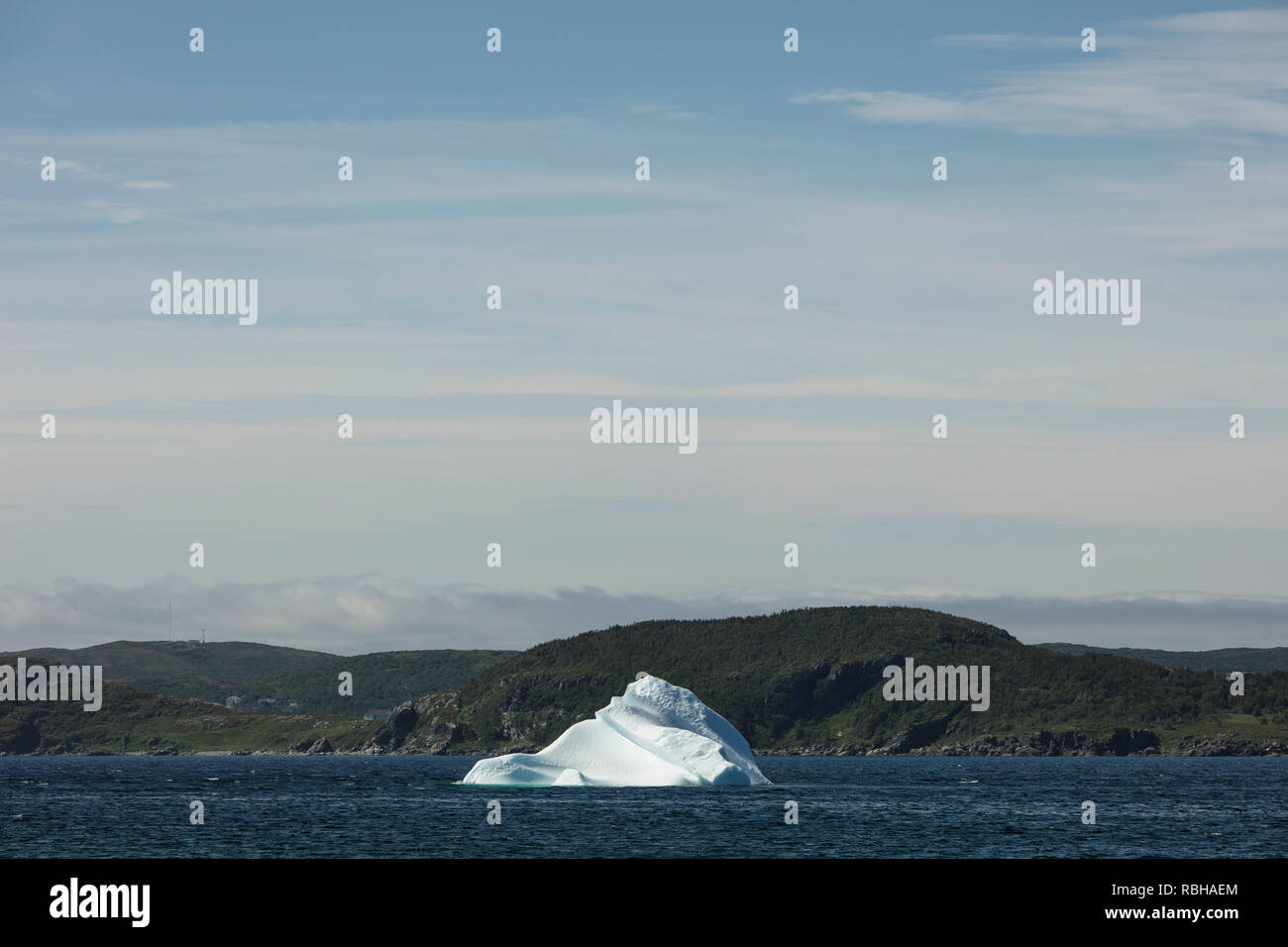 ST ANTHONY, NEWFOUNDLAND, CANADA - July 24, 2018: An iceberg in St Anthony Bight on the Labrador Sea in the Northern area of Newfoundland. Stock Photo