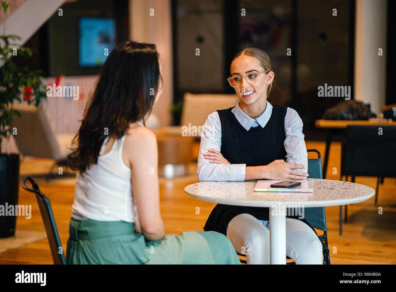 Two Male Friends Laughing In An Istanbul Cafe Stock Photo