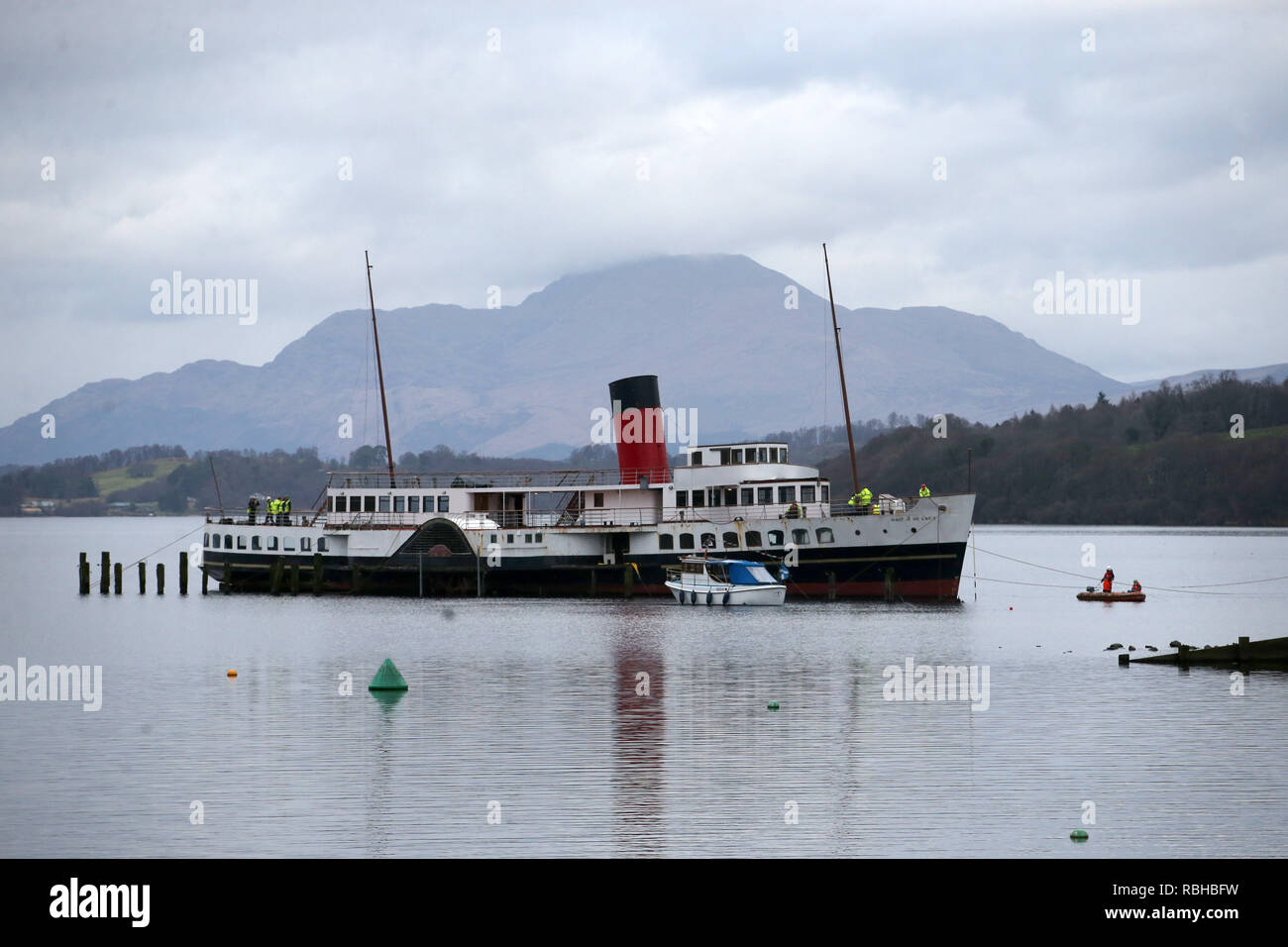 The Maid of the Loch in Loch Lomond before the craddle carrying the vessel snapped during the 'slipping' of the historic steamer as it was being hauled out the water by the original winchhouse and onto the Balloch Steam Slipway, Balloch. Stock Photo