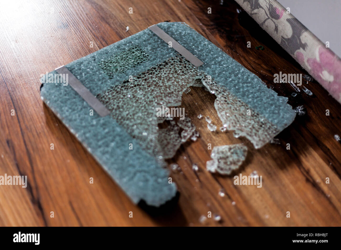 Broken digital human scale on the floor. Broken glassy digital scale