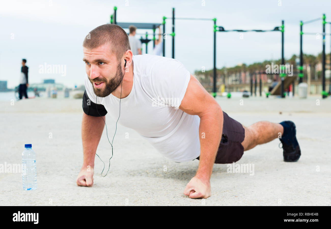 Strong man performs push ups hi-res stock photography and images - Alamy