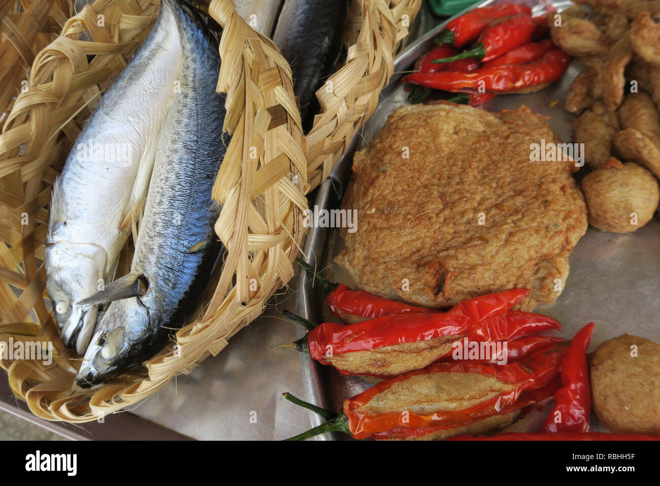 Tofu and fresh mackerel fish on sale, Cho Co Giang Market, Ho Chi Minh City, Vietnam Stock Photo