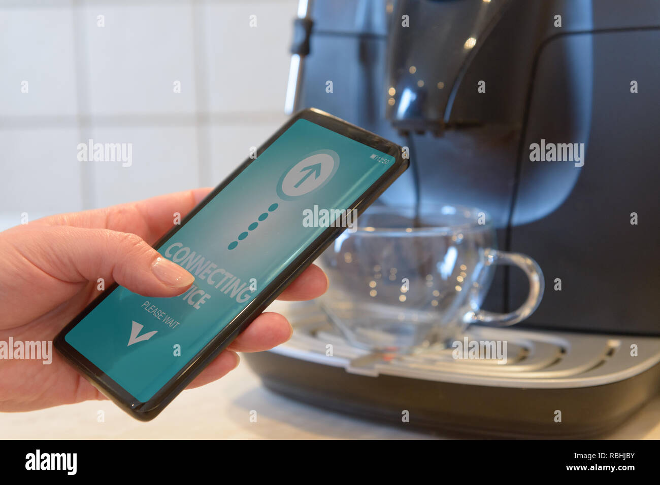 Connecting coffee machine with smart phone. Smart home and of