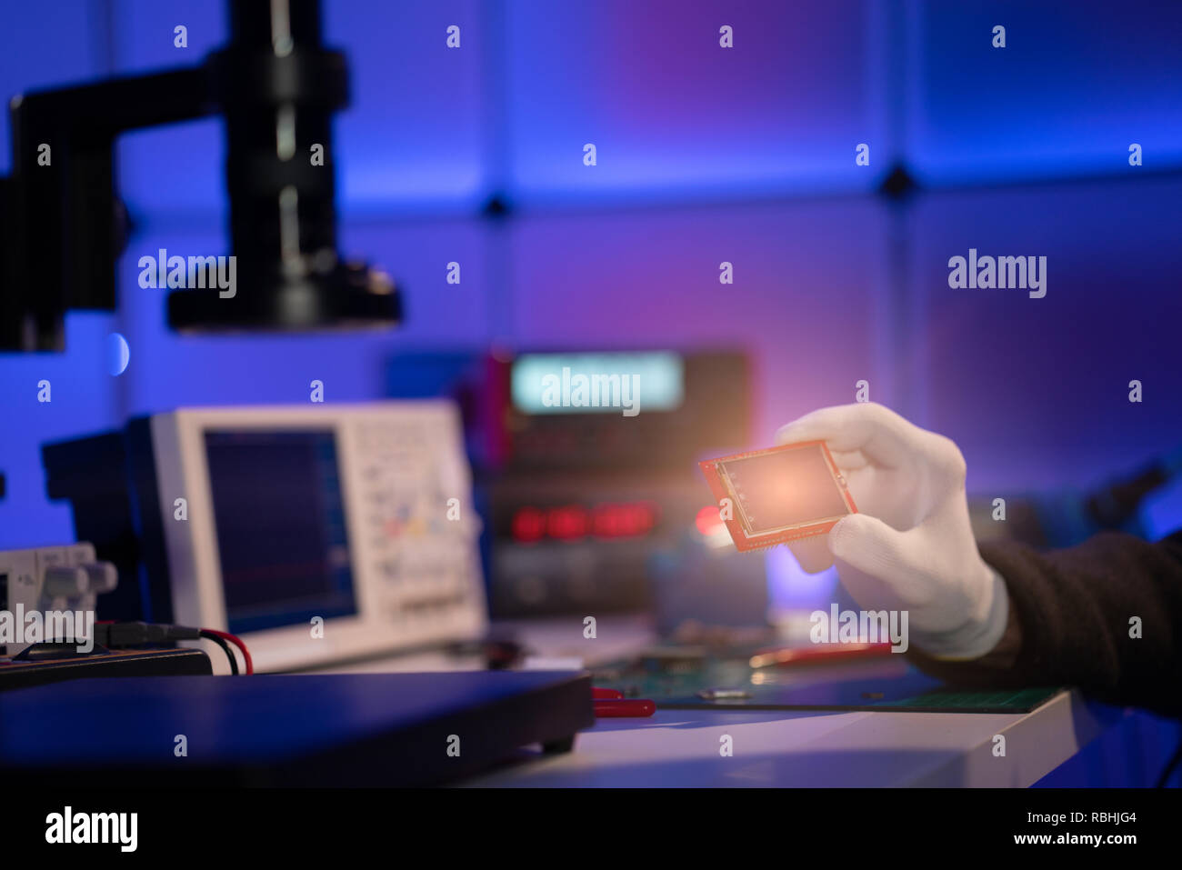 Check electronics device in industrial lab Stock Photo