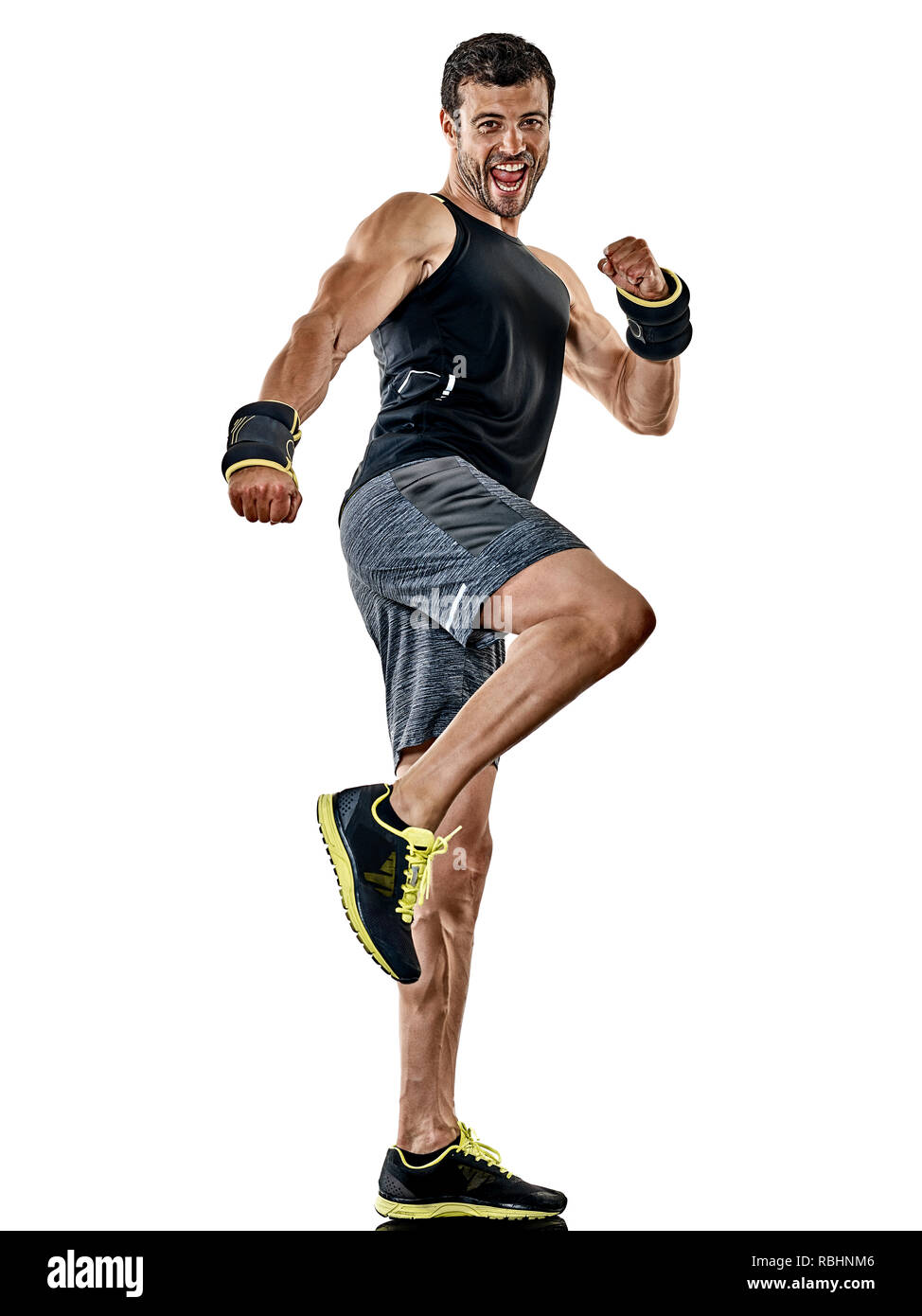 one caucasian fitness man exercising cardio boxing exercises in studio