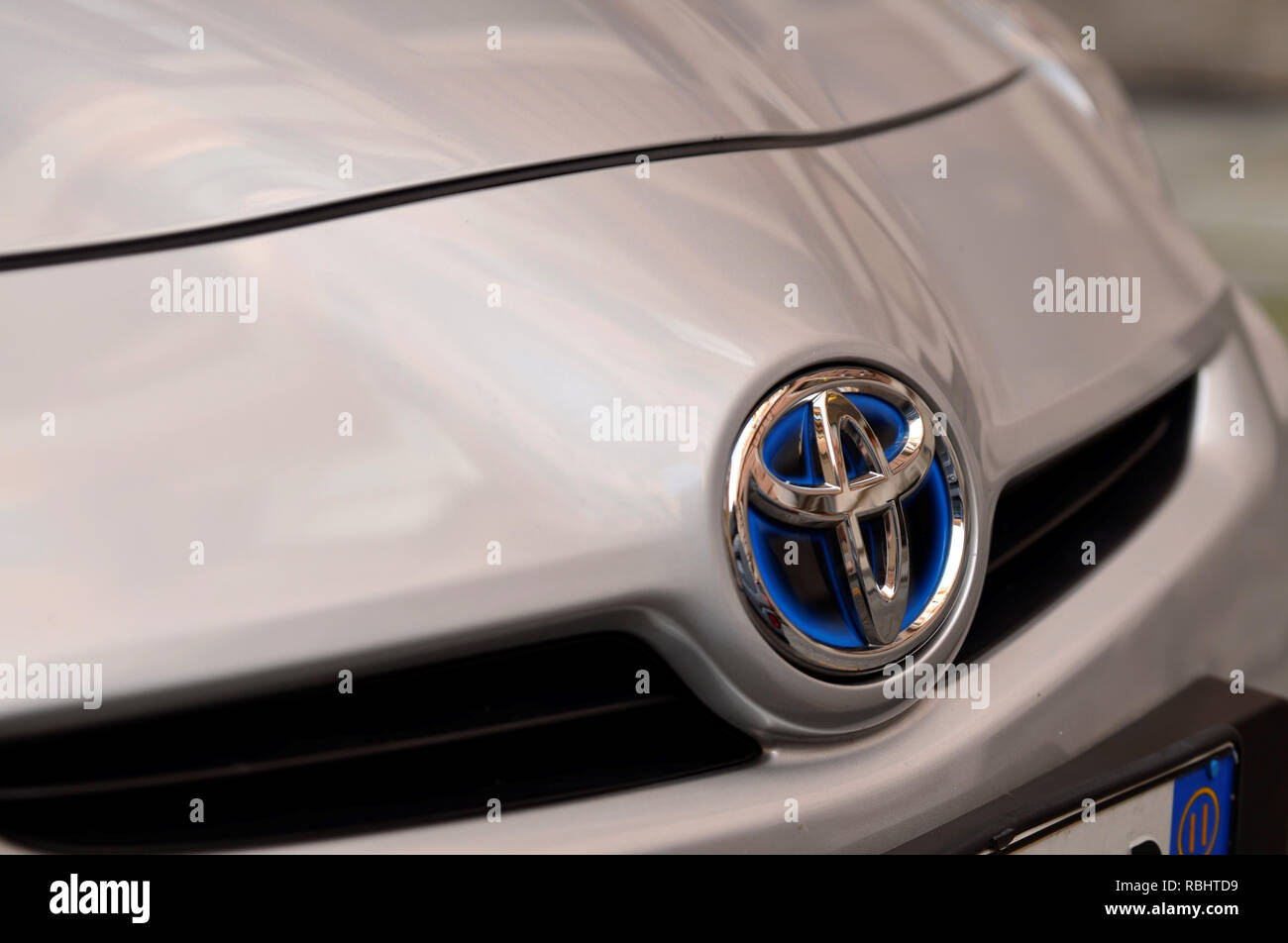 Turin, Piedmont, Italy. June 2018. The emblem of the Toyota with hybrid engine, is distinguished by the internal contour in electric blue. Stock Photo