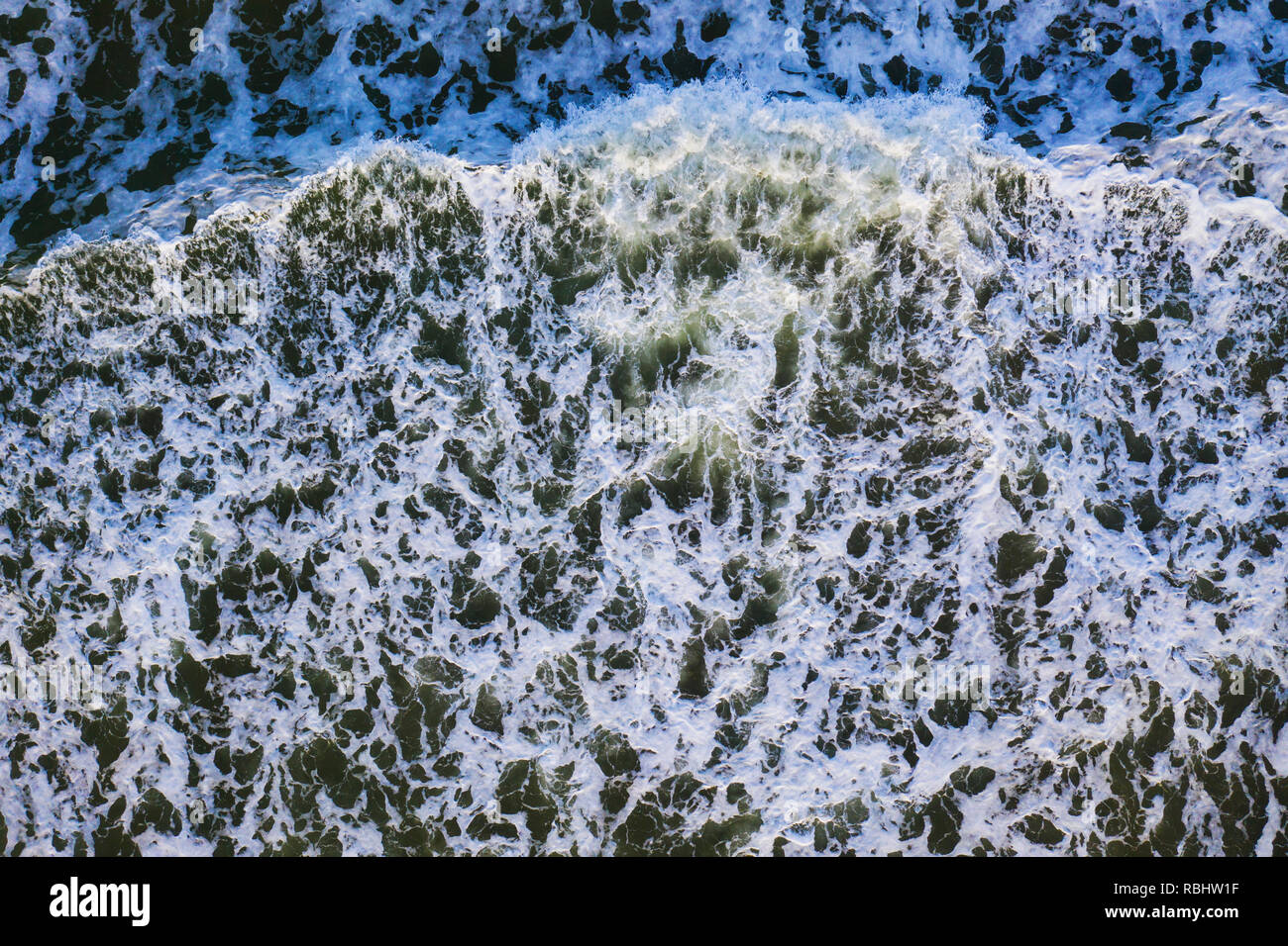 Aerial overhead view of beautiful breaking ocean waves Stock Photo