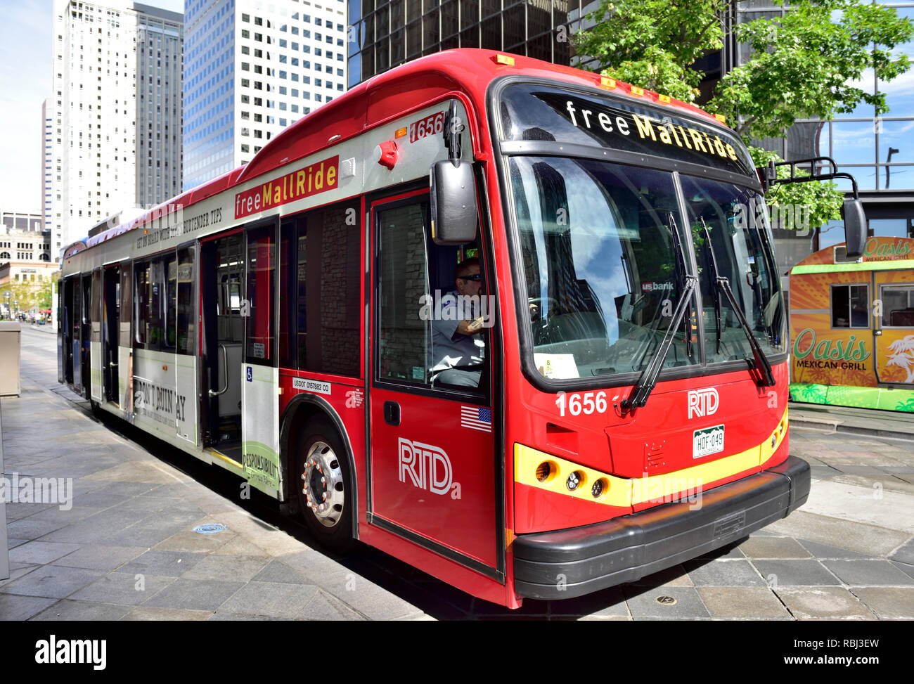 Free to ride public transport mall shuttle bus along busy of downtown Free to ride public transport mall shuttle bus along busy of downtown