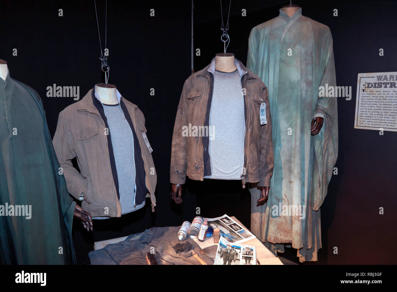 Distressed Costumes worn by Daniel Radcliffe and Ralph Fiennes as  Harry Potter and Lord Voldemort in the final battle.in the Deathly Hallows  Part II Stock Photo