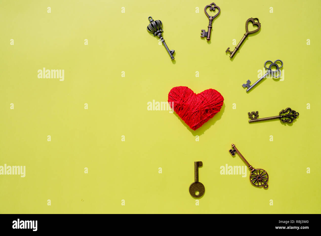 red heart lock with key lean against vintage pole, vlentine love symbol ...