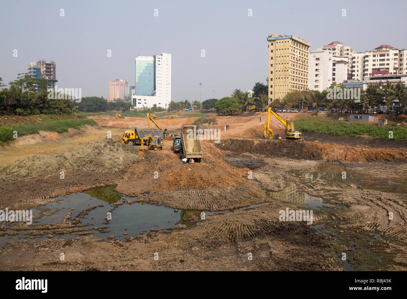 DHAKA, BANGLADESH - JANUARY 10 : Labors working at a development ...