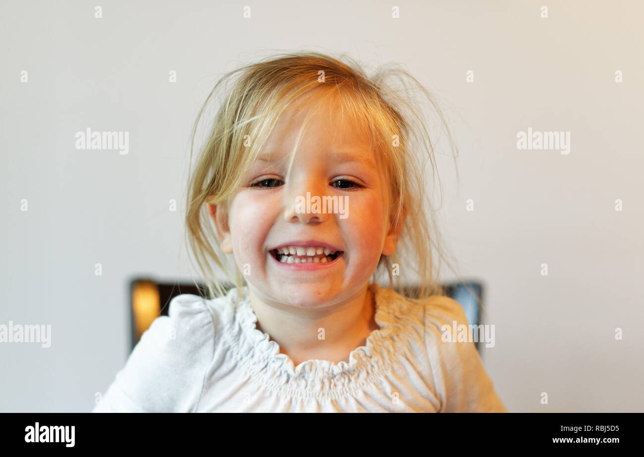A portrait of a beautiful smiling four year old girl Stock Photo