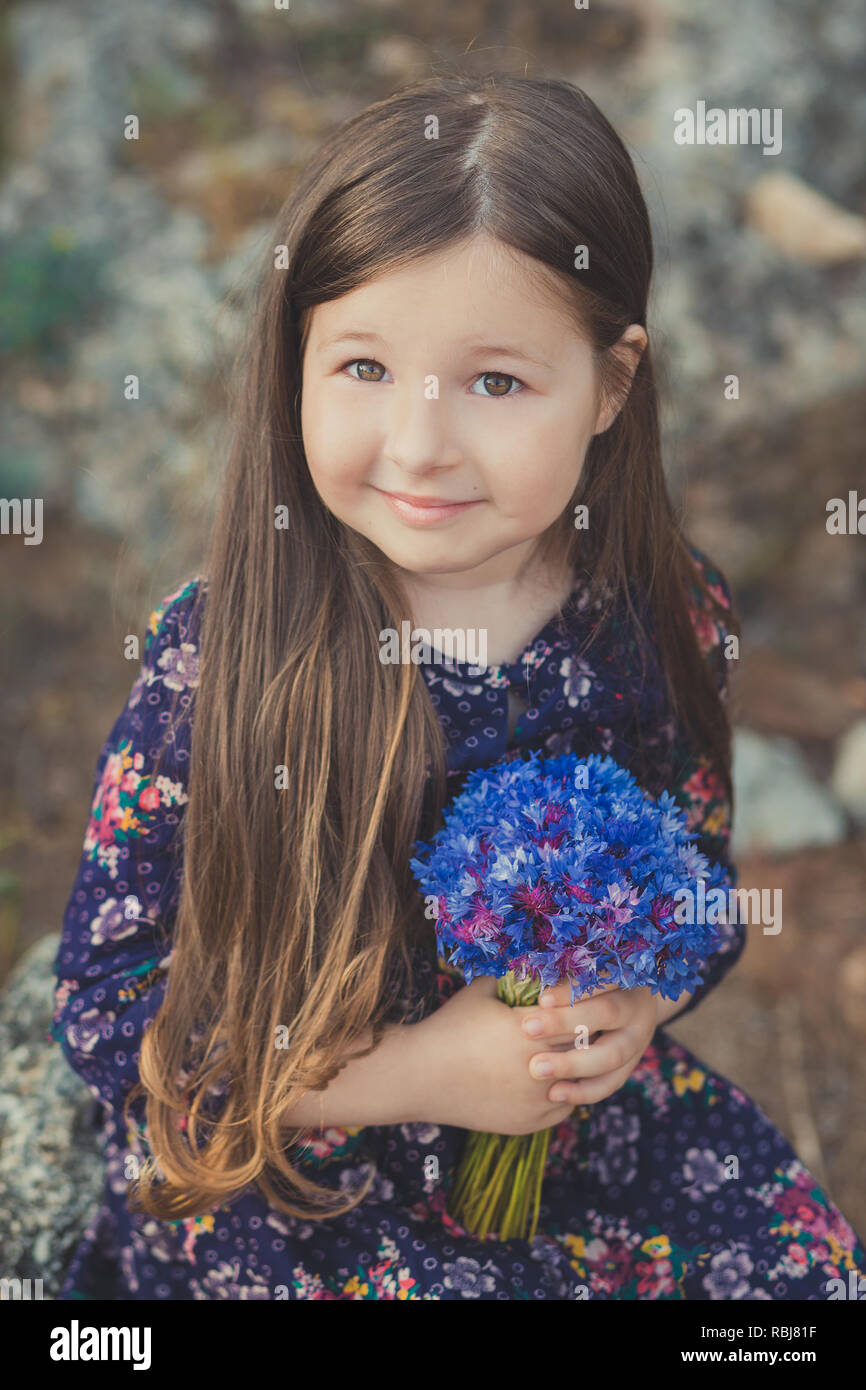 Cute baby girl with brunette hair and brown eyes portrait with ...
