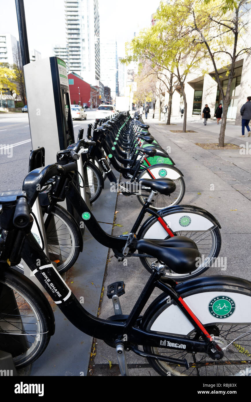 Toronto Bike share  bikes parked on Bay Street in Toronto Stock Photo