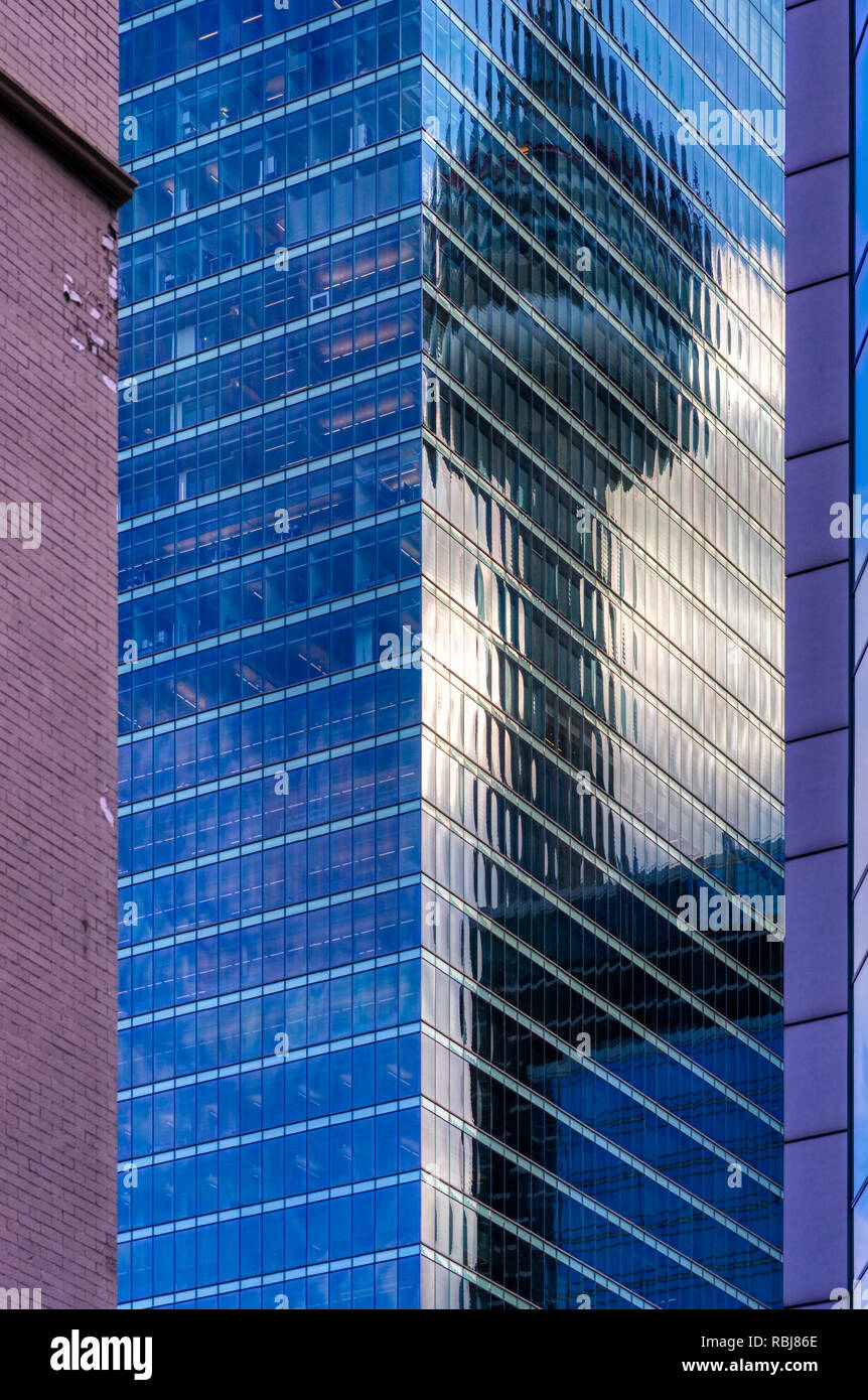 The CN Tower reflected in the RBC Centre (aka The RBC Dexia Building) in Toronto, Canada as seen from David Pecaut Square Stock Photo