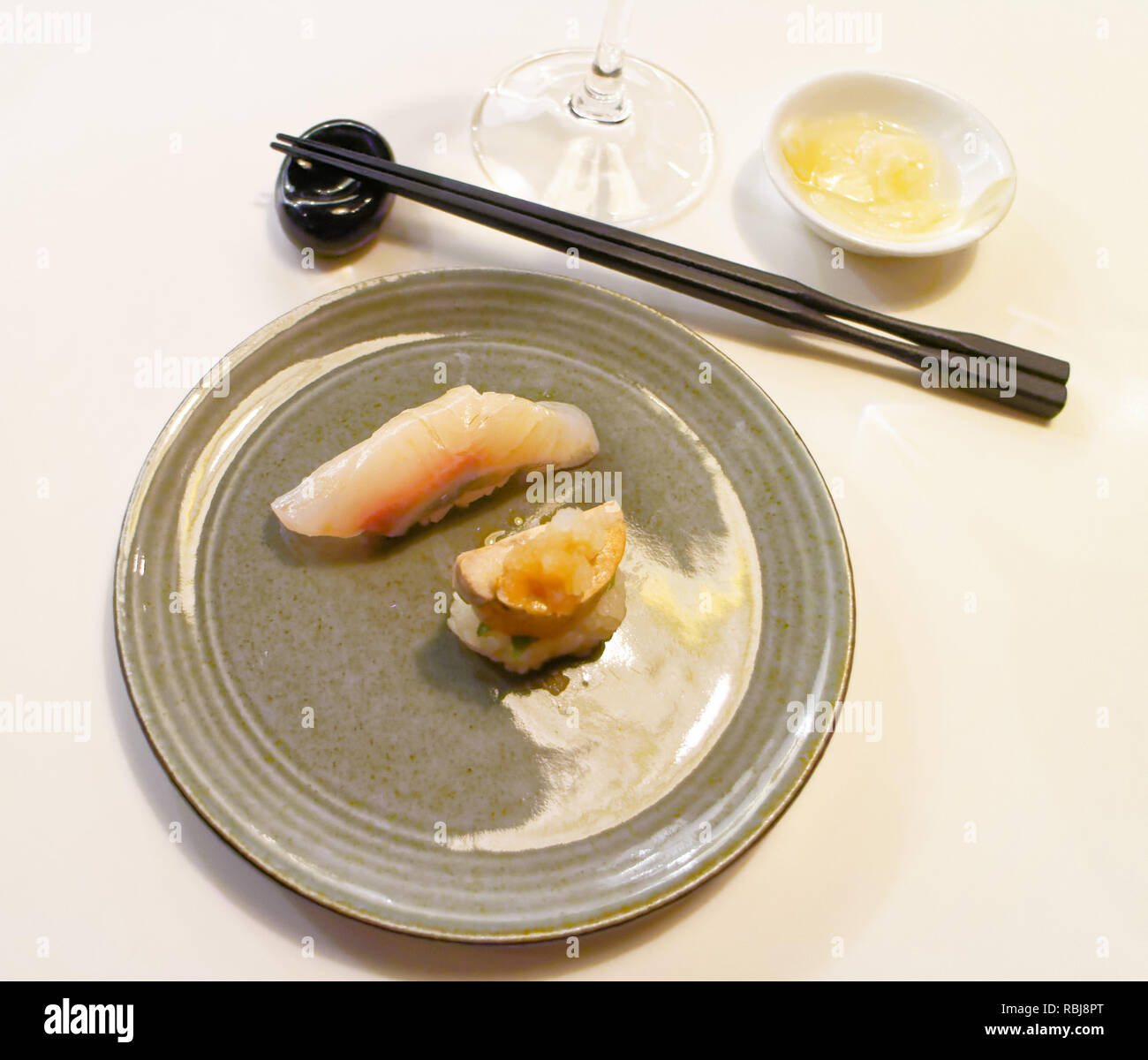 A plate of monkfish liver and amberjack (kanpachi) sushi in Yasu Omakase Sushi Bar in Toronto, Canada Stock Photo