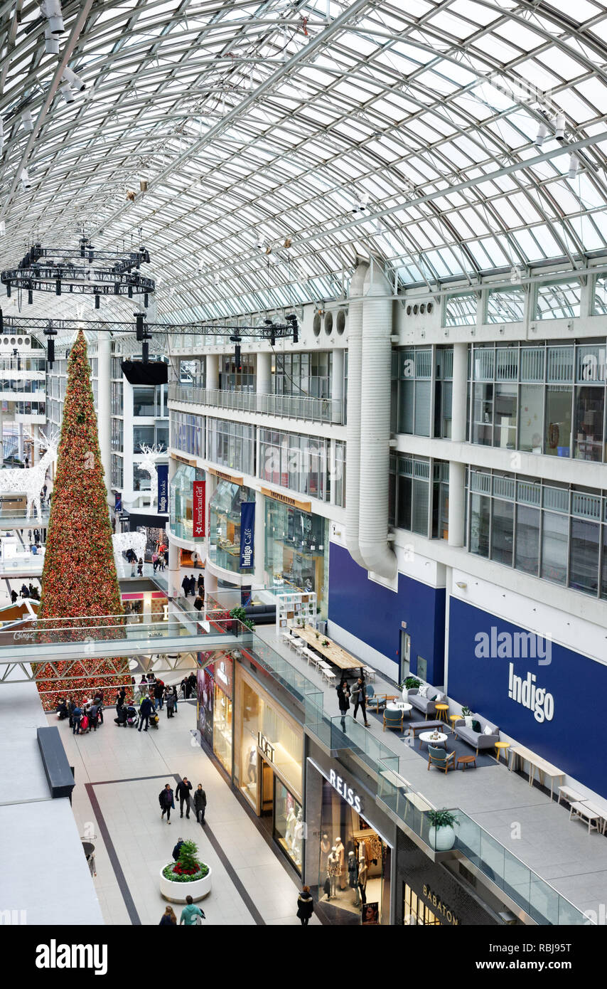 The big Christmas tree inside the Eaton Centre in Toronto, Canada Stock Photo