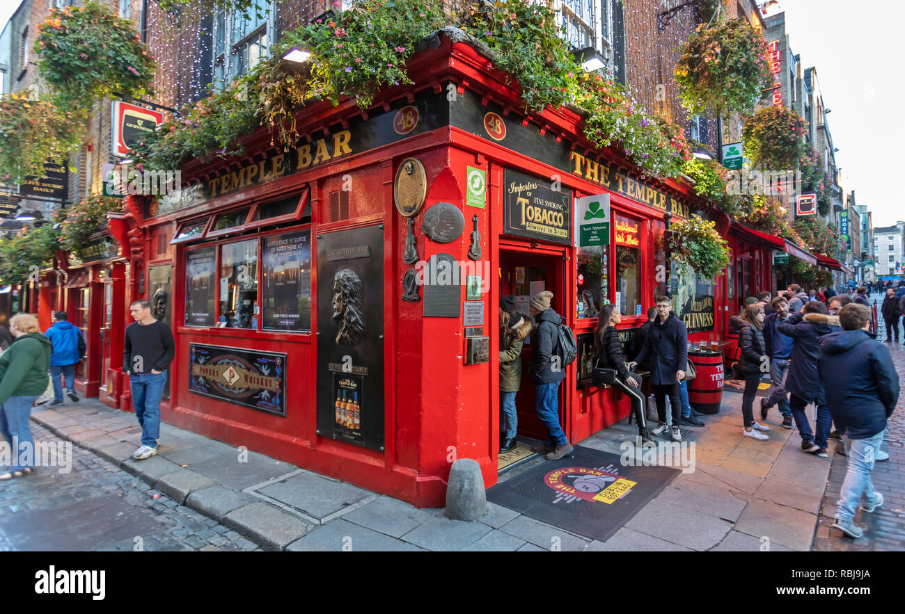 Visitors and tourists explore the Temple Bar district in Dublin