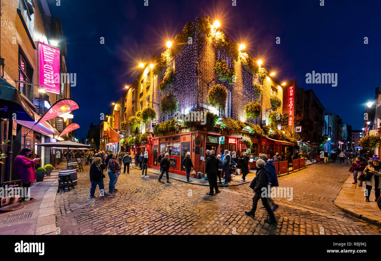 Visitors and tourists explore the Temple Bar district in Dublin