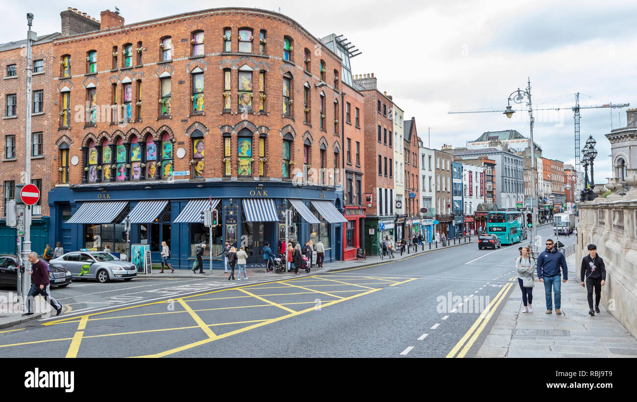 Standing on the corner of Parliament St and Dame St and looking in the direction of Trinity College in Dublin, Ireland. Stock Photo