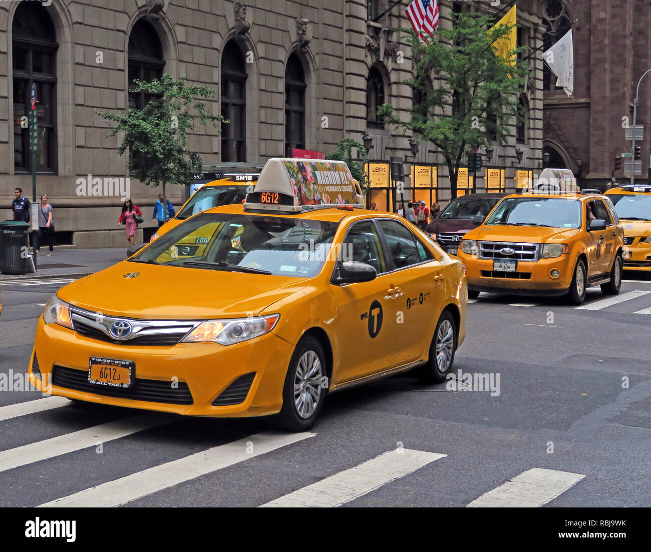 Canary yellow Medallion New York taxiCab, for hire ,Manhattan, New York City, NY, USA Stock Photo