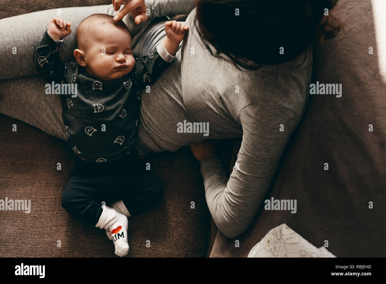 Mother and baby on lap hires stock photography and images Alamy