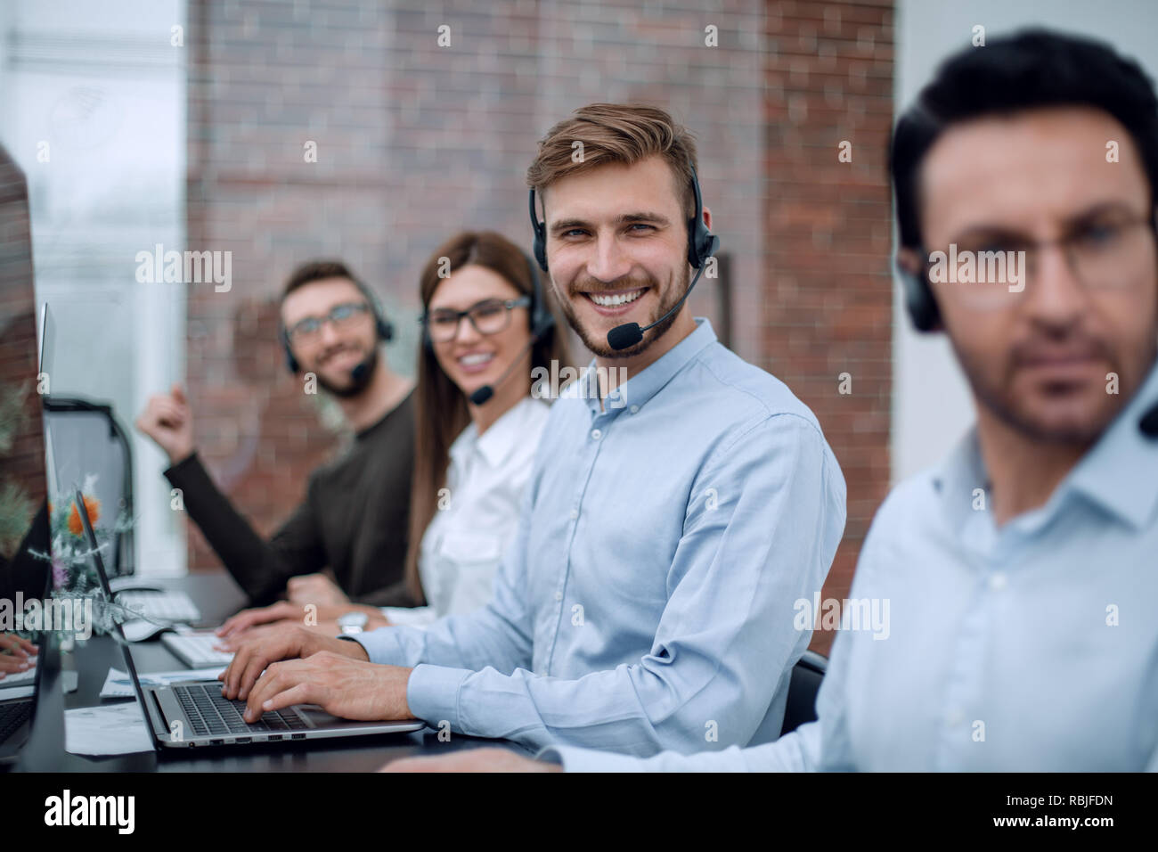 technical support specialists in the workplace Stock Photo - Alamy