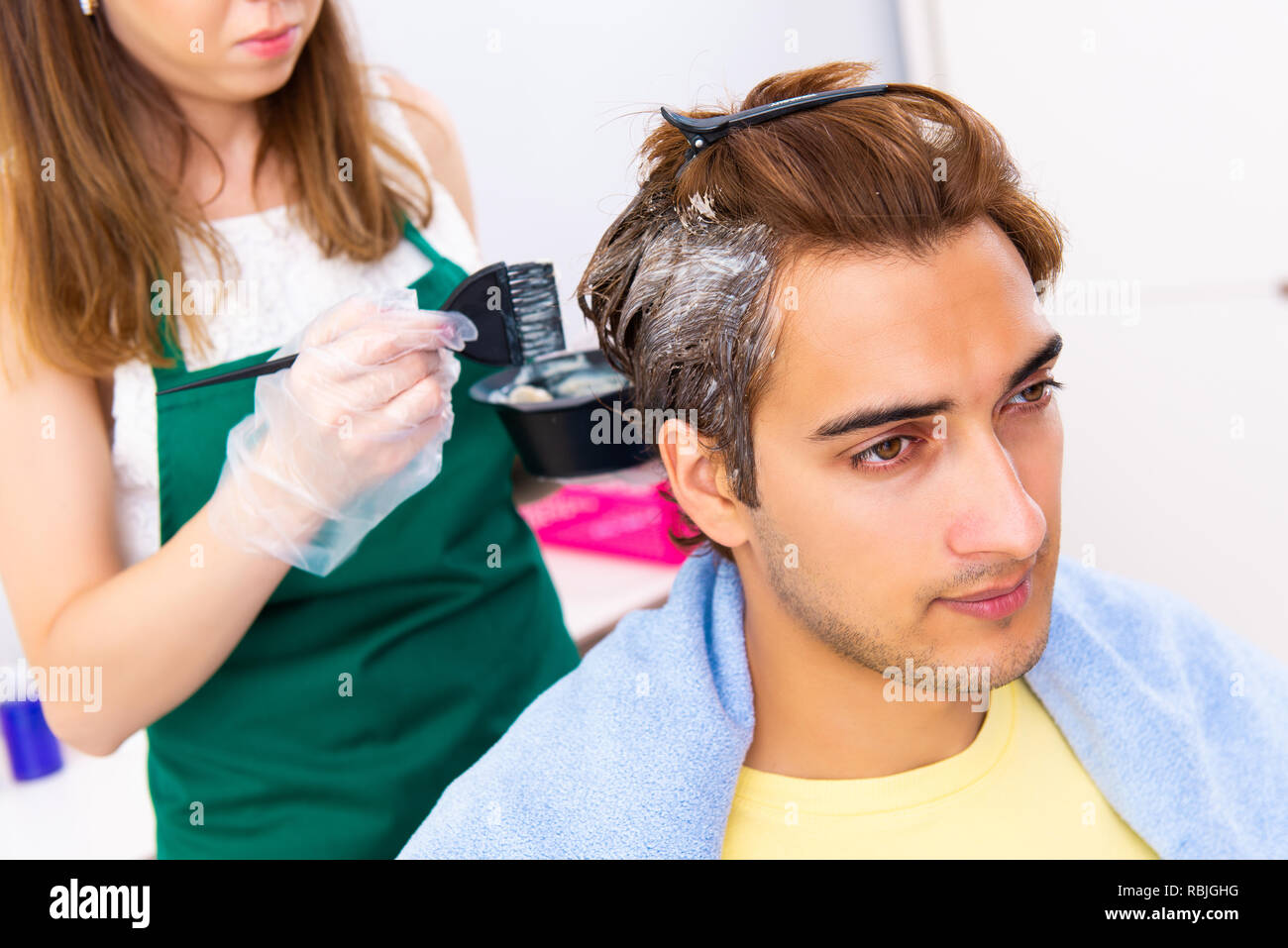 Woman Hairdresser Applying Dye To Man Hair Stock Photo 230904172